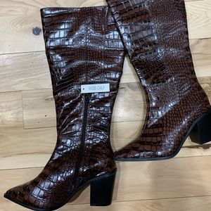 Healed boots new. Wide calf new